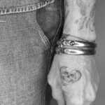 Tiny Heart Skull Tattoo